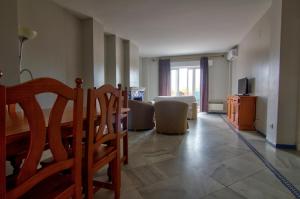 Televízia a/alebo spoločenská miestnosť v ubytovaní Apartamentos Aloha2 El Puerto de Santa Maria