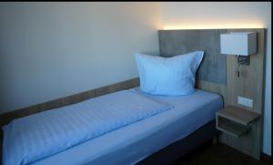 Postel nebo postele na pokoji v ubytování Hotel - Restaurant Veldscholten