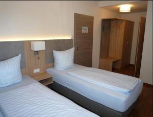 Postel nebo postele na pokoji v ubytování Hotel - Restaurant Veldscholten