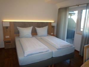Postel nebo postele na pokoji v ubytování Hotel - Restaurant Veldscholten