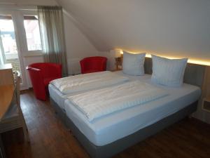 Postel nebo postele na pokoji v ubytování Hotel - Restaurant Veldscholten