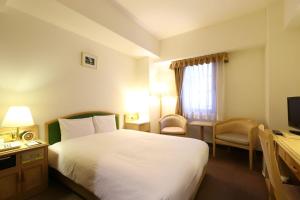 TV a/nebo společenská místnost v ubytování Smile Hotel Nagoya Shinkansenguchi