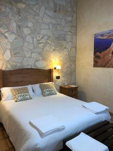 Postel nebo postele na pokoji v ubytování Alquería Las Torres a dos pasos de Toledo y de Las Barrancas de Burujón + 37 fotografií