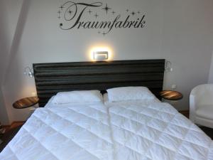 Postel nebo postele na pokoji v ubytování Fewo Neptun im Landhaus Immenbarg