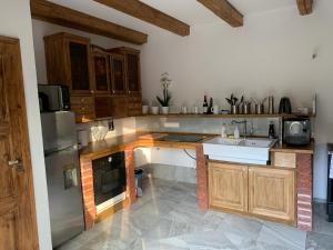 Kuchyň nebo kuchyňský kout v ubytování Apartmán Stodola