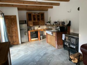 Kuchyň nebo kuchyňský kout v ubytování Apartmán Stodola