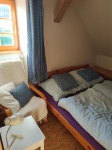 Postel nebo postele na pokoji v ubytování Apartmán Švandovi