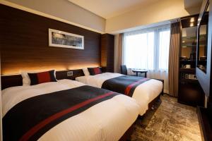 Postel nebo postele na pokoji v ubytování S-peria Hotel Kyoto + 22 fotografií