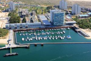 an aerial view of a marina with boats in the water at Troia Residence by The Editory - Apartamentos Marina in Troia