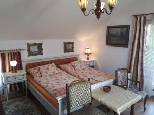 Postel nebo postele na pokoji v ubytování Penzion Hugo