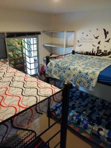 Ένα ή περισσότερα κρεβάτια σε δωμάτιο στο Casa Campestre Rivera