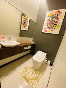 Ванная комната в Palm Tree House Ishigaki - パームツリーハウス石垣