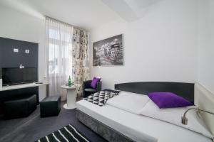 Postel nebo postele na pokoji v ubytování Eisberg Hotel Schwanen