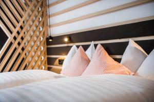 A bed or beds in a room at Garni La Ciasota 3s