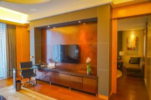 Televiisor ja/või meelelahutuskeskus majutusasutuses Hyatt Regency Dongguan