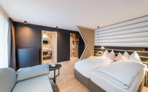 A bed or beds in a room at Garni La Ciasota 3s