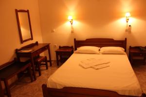 Theofilos Appartements客房内的一张或多张床位