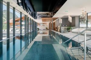 The swimming pool at or close to Alpin Life Resort Lürzerhof