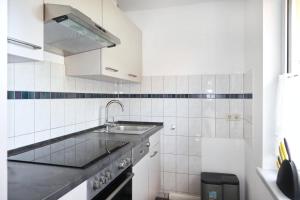 Kuchyň nebo kuchyňský kout v ubytování Ferienhaus Till & Lotte