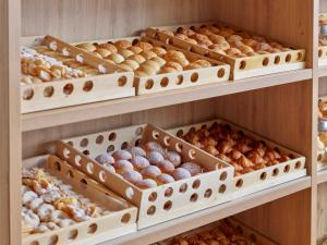a bakery filled with lots of different types of pastries at Maistra Select Family Hotel Amarin in Rovinj