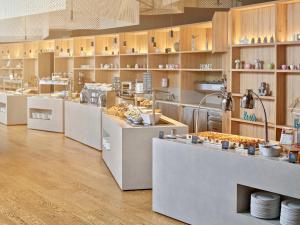 a large kitchen with a lot of food at Maistra Select Family Hotel Amarin in Rovinj