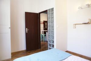 Posteľ alebo postele v izbe v ubytovaní Classic apartments Pilsudskiego street