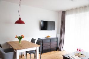 Telewizja i/lub zestaw kina domowego w obiekcie Appartements Freiraum
