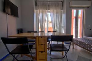 Televízia a/alebo spoločenská miestnosť v ubytovaní Apartamentos Aloha2 El Puerto de Santa Maria