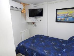 En tv och/eller ett underhållningssystem på Istanberry - Dream Economy Apartments