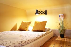 Posteľ alebo postele v izbe v ubytovaní Classic apartments Pilsudskiego street