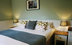 Ένα ή περισσότερα κρεβάτια σε δωμάτιο στο The Oyster Smack