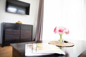 Telewizja i/lub zestaw kina domowego w obiekcie Appartements Freiraum