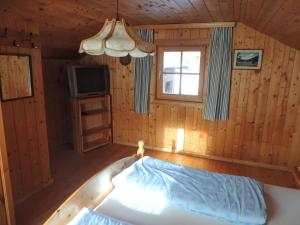 Postel nebo postele na pokoji v ubytování Winklhütte