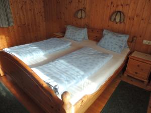 Postel nebo postele na pokoji v ubytování Winklhütte