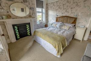 Uma cama ou camas num quarto em Craiglands Bed and Breakfast, Grassington