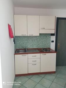 Кухня или мини-кухня в La Residenza Aparthotel
