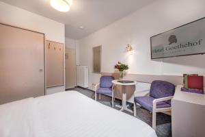 Postel nebo postele na pokoji v ubytování Hotel Goethehof
