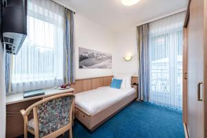 Postel nebo postele na pokoji v ubytování Hotel Goethehof
