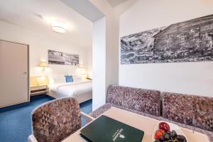 Postel nebo postele na pokoji v ubytování Hotel Goethehof