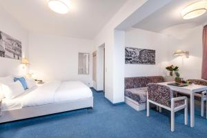 Postel nebo postele na pokoji v ubytování Hotel Goethehof