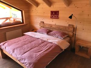 Кровать или кровати в номере Kozichky Guest House