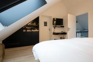 Postel nebo postele na pokoji v ubytování B&B Amelhof