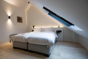 Postel nebo postele na pokoji v ubytování B&B Amelhof