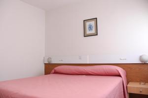 Postel nebo postele na pokoji v ubytování Hotel Menossi