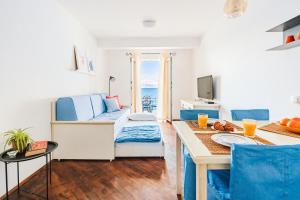 Posezení v ubytování Sutivan Best Apartments