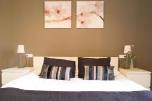 Cama o camas de una habitación en Barcelonaguest