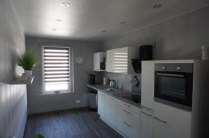 Kuchyň nebo kuchyňský kout v ubytování Tolle Mittelgeschosswohnung