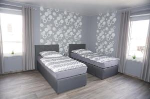 Postel nebo postele na pokoji v ubytování Tolle Mittelgeschosswohnung