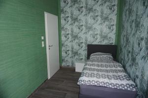 Postel nebo postele na pokoji v ubytování Tolle Mittelgeschosswohnung