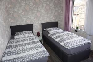 Postel nebo postele na pokoji v ubytování Tolle Mittelgeschosswohnung